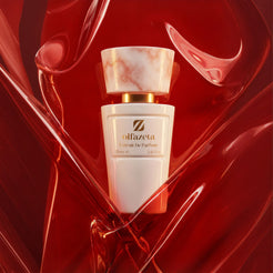 Flacon blanc Olfazeta by Chogan Millésime N°23 au bouchon marbré, enlacé de vagues de verre rouge translucide